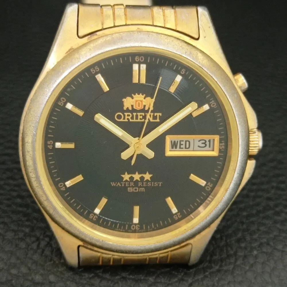 Vintage 1972 Orient Automatic Mens Gold Watch W/daydate & Black accents